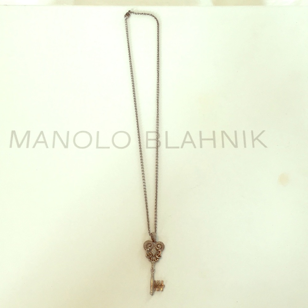 Beautiful key sterling silver with diamonds